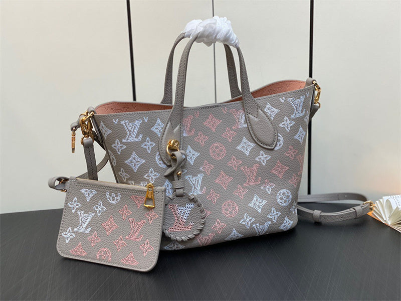  Understated carryall bag carried on shoulder
