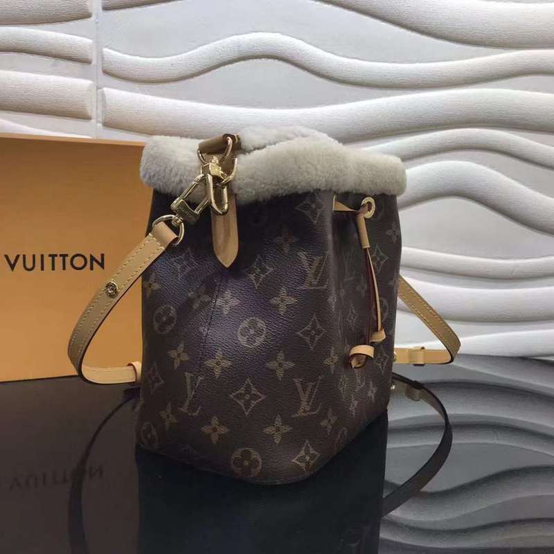 Close-up detail of modern signature women's handbag – women's luxury accessory