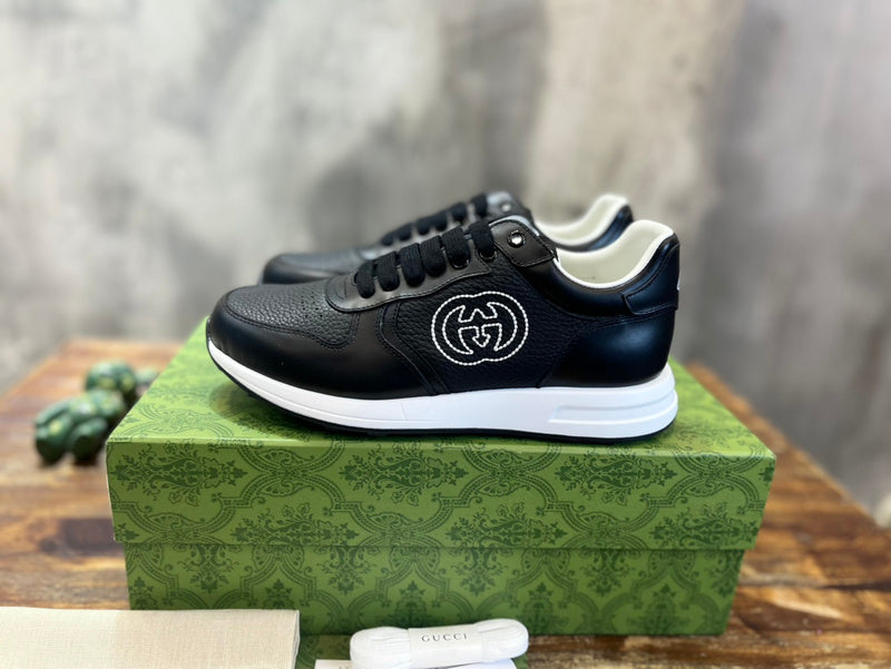 Gucci tonal black luxury sneakers view 7 bold athletic profile