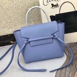Close-up detail of modern structured women's handbag – women's designer-style accessory