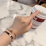 Side view of Cartier unisex jewelry piece