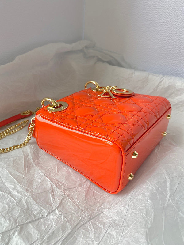 Styled lifestyle shot of structured signature women's handbag – women's designer-style accessory