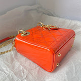 Styled lifestyle shot of structured signature women's handbag – women's designer-style accessory