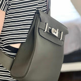  crossbody bag close-up of hardware and finish 11
