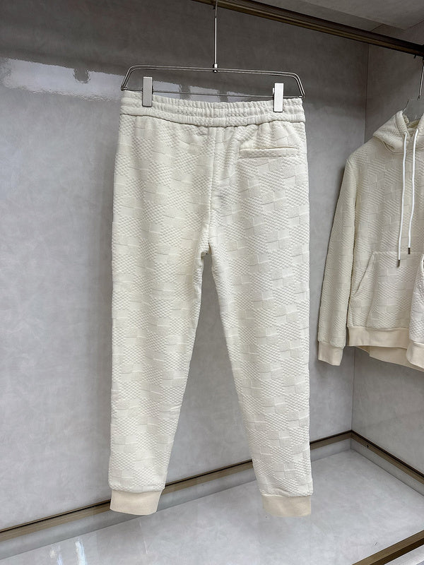 Close-up detail shot of Louis Vuitton luxury clothing with streetwear-inspired cut