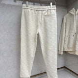 Close-up detail shot of Louis Vuitton luxury clothing with streetwear-inspired cut