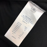 Flat lay presentation of Louis Vuitton cotton t-shirt with label-forward styling