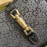 Handle and strap detail of polished sleek women's handbag – women's everyday handbag