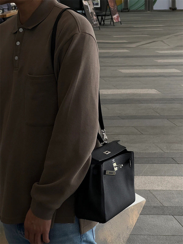  Structured top-handle bag carried on shoulder 10