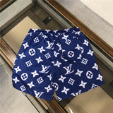 Close-up detail shot of Louis Vuitton cotton t-shirt with label-forward styling