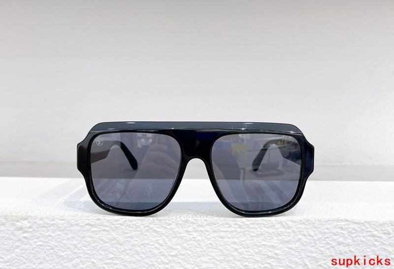 Close-up detail view of Louis Vuitton unisex sunglasses