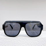 Close-up detail view of Louis Vuitton unisex sunglasses