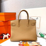 Side view of timeless structured handbag
