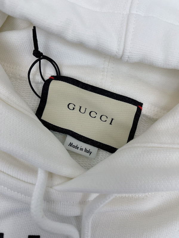 Full styled look of Gucci luxury clothing with logo-detail design