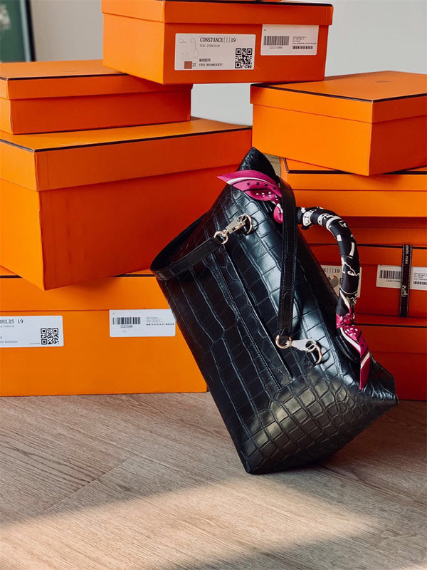 Side view of contemporary structured handbag