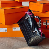 Side view of contemporary structured handbag