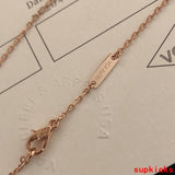 Side view of Van Cleef & Arpels unisex jewelry piece