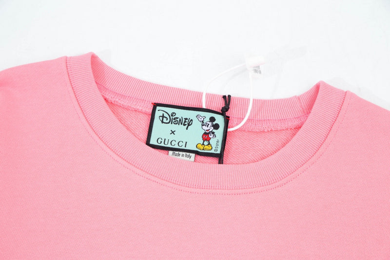 Close-up detail shot of Gucci luxury clothing with streetwear-inspired cut