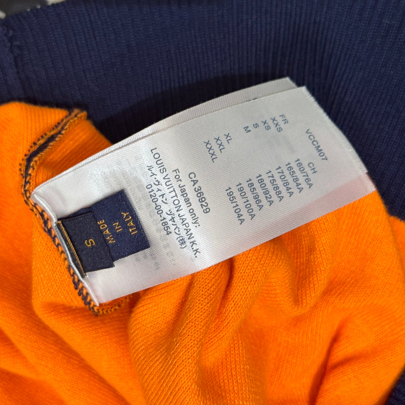 Front view of Louis Vuitton luxury clothing with label-forward styling