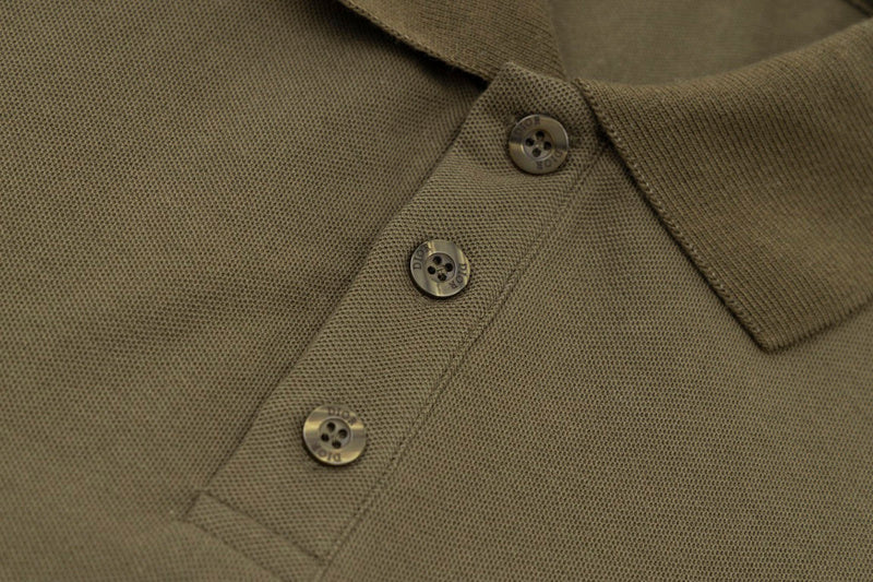 Close-up detail shot of Polo cotton polo shirt with logo-detail design