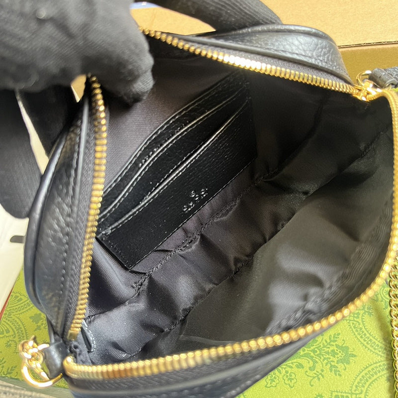 Side profile of structured classic women's handbag – women's luxury handbag