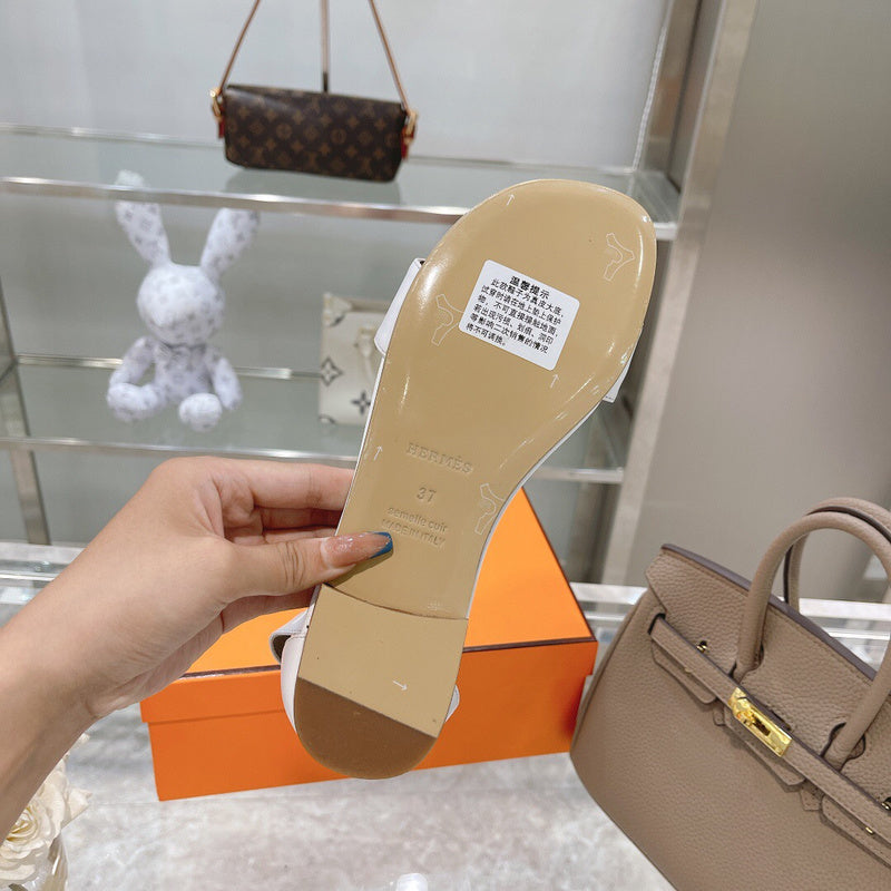 Hermes shoes Style 323 - close-up of classic monogram styling (alternate angle)