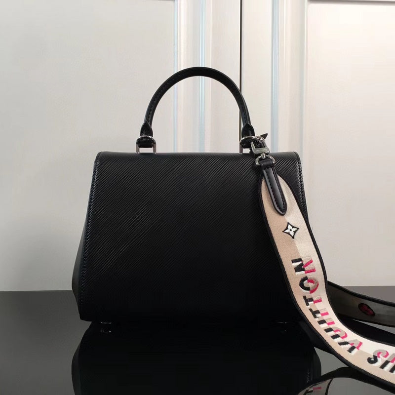 Side profile of sleek statement women's handbag – women's premium purse
