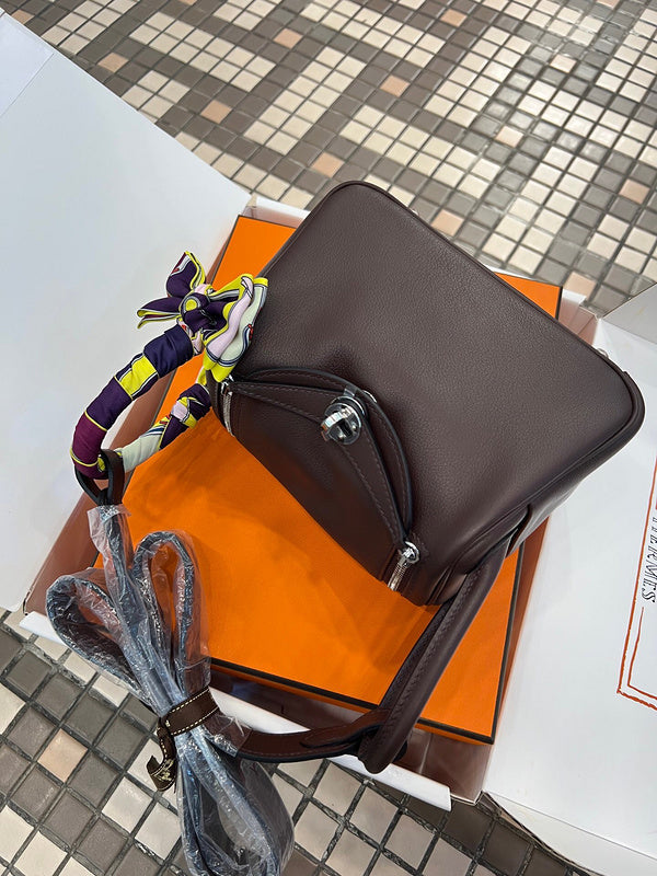 Side view of sleek structured handbag