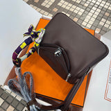 Side view of sleek structured handbag