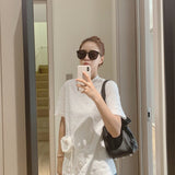  Refined tote bag carried on shoulder