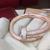 Close-up detail view of Cartier unisex jewelry piece