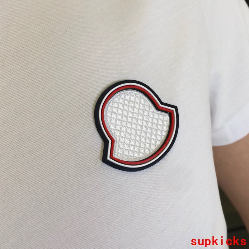 Close-up detail shot of Moncler luxury clothing with contemporary cut