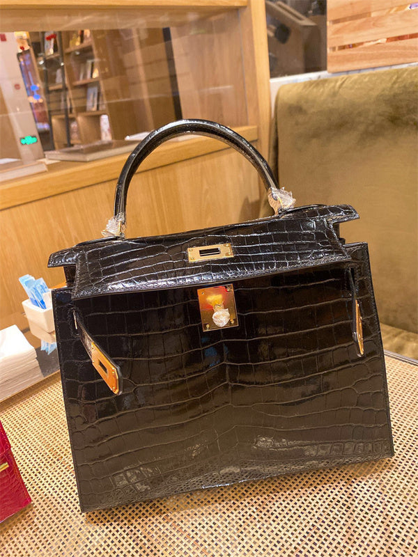  Elegant top-handle bag carried on shoulder