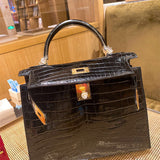  Elegant top-handle bag carried on shoulder