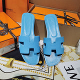 Hermes sandals Style 058 - styled lifestyle view