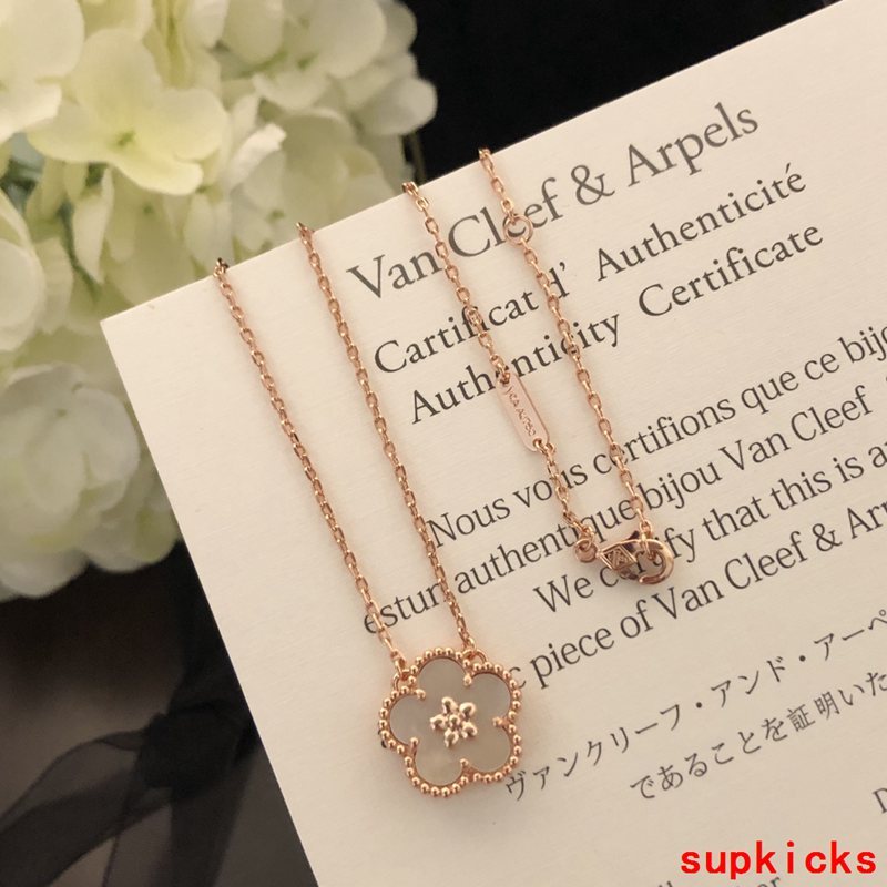 Lifestyle view of Van Cleef & Arpels unisex jewelry piece