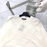 Front view of Louis Vuitton luxury clothing with signature branding