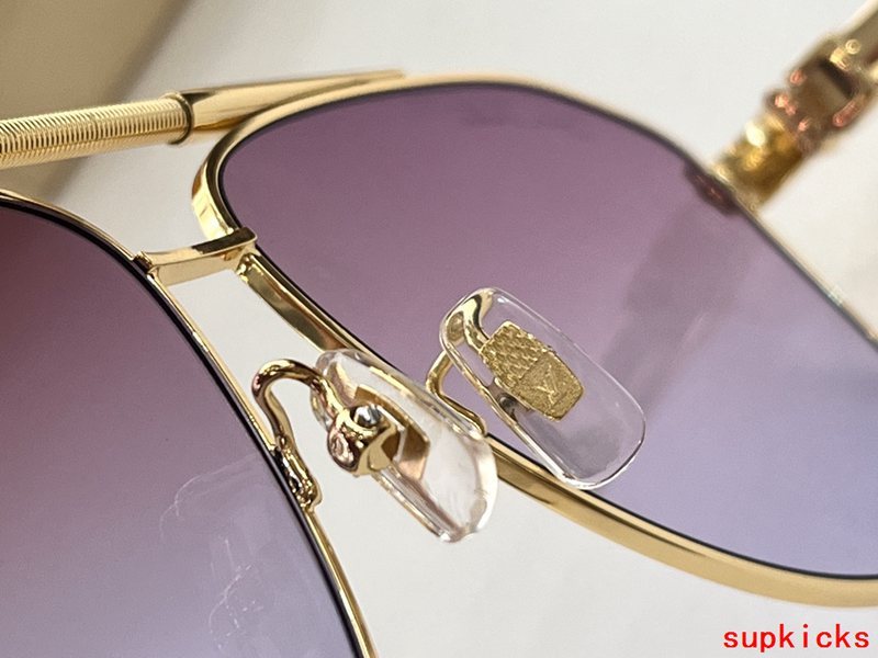 Close-up detail view of Louis Vuitton unisex sunglasses