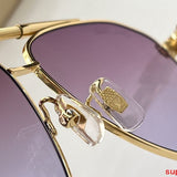 Close-up detail view of Louis Vuitton unisex sunglasses