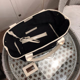 Interior view of modern sleek women's handbag – women's designer-style accessory