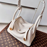  Timeless top-handle bag carried on shoulder 22