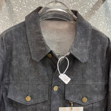 Flat lay presentation of Louis Vuitton luxury clothing with monogram-inspired silhouette