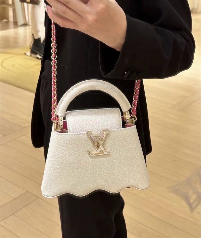  polished top-handle bag detail view showing craftsmanship