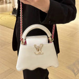  polished top-handle bag detail view showing craftsmanship