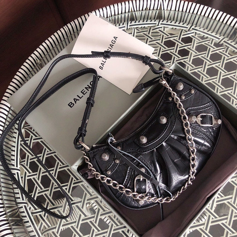 Side profile of everyday-luxe polished women's handbag – women's luxury accessory