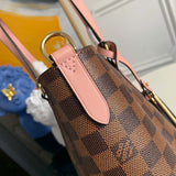 Styled lifestyle shot of classic signature women's handbag – women's luxury handbag