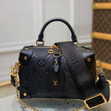 Side profile of elevated classic women's handbag – women's statement bag
