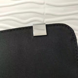Handle and strap detail of classic premium women's handbag – women's statement bag