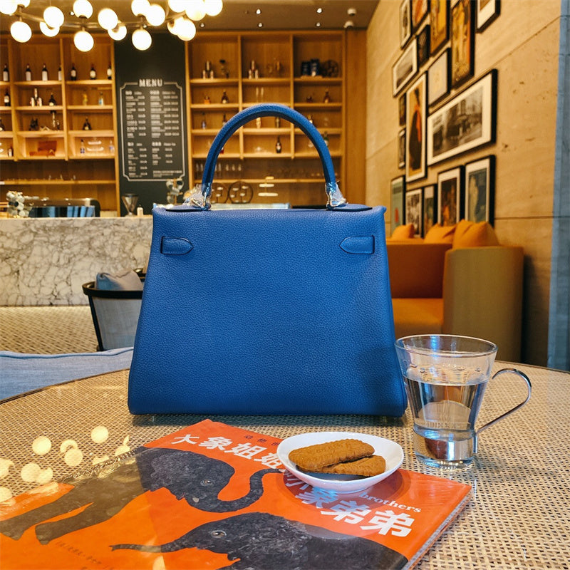 Side view of refined structured handbag
