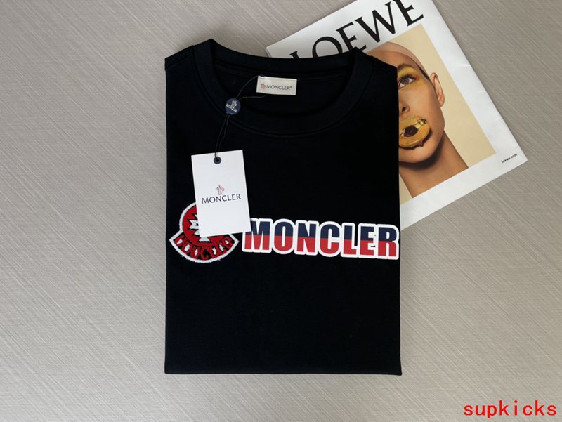 Close-up detail shot of Moncler luxury clothing with contemporary cut